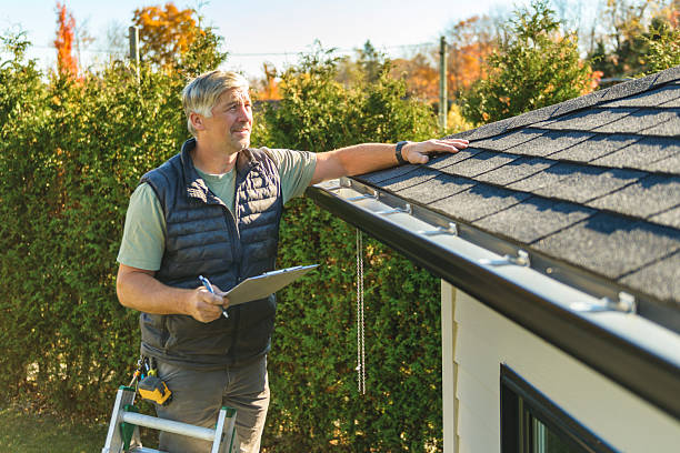 Professional Storm Damage Roof Repair technician working in Westpoint, TN